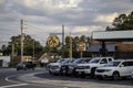 A car dealership on a corner in a small town in Florida.