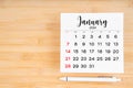 Jauary 2024 calendar page and pen on wooden background Royalty Free Stock Photo