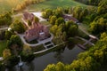 Jaunmoku brick medieval castle and its territory near Tukums, Latvia, drone view