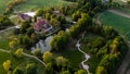 Jaunmoku medieval brick castle complex with pond and park near Tukums, Latvia, drone view