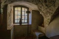 Jaunpils, Latvia - May 15, 2019: A basement reception area and dining room  in medieval 14th Century Jaunpils Castle, now a hotel Royalty Free Stock Photo