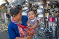 JAVA, INDONESIA - DECEMBER 21, 2016: Mother and child doing shop