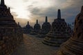 Amazing sunrise view of stone stupas. Ancient Borobudur Buddhist temple in Java Royalty Free Stock Photo