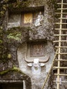 Java, Indonesia, June 13, 2022 - Prestigious Toraja citizens are buried in manually carbed out slots in a rock hillside Royalty Free Stock Photo