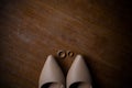 java wedding closeup attribute with a pair of rings and bridal shoes negative space, top view Royalty Free Stock Photo