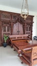 Javanese Carvings and Wooden Chairs make the house look even more vintage