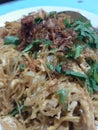 Javanese fried noodles with a sprinkling of delicious celery fried onions when eaten warm