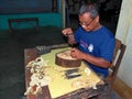 Javanese Man Making a Wayang Puppet, Yogyakarta, Indonesia