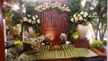 Javanese wedding stage decoration with fresh flowers Royalty Free Stock Photo