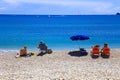 People sunbathing and relaxing on a Sunny day on the beach Royalty Free Stock Photo