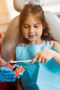 Jaw anatomical model teeth brushing close-up. Pediatric dentist teaching oral hygiene lesson for kids in dentistry. The Royalty Free Stock Photo
