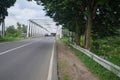 Jawa Barat, Indonesia, February 17 2023 : bridge with lonely road users