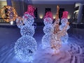 Jazz band of merry snowmen. Concert all night. New year illumination 2022. The concept of New year and Christmas. Royalty Free Stock Photo