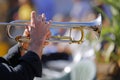 Jazz musician plays his shining trumpet