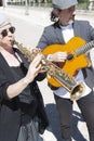 Jazz musicians dressed in retro style playing in the street Royalty Free Stock Photo