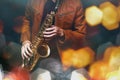 Jazz saxophone player in performance on the stage. color filter Royalty Free Stock Photo