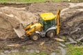 JCB 3CX machinery a tractor bucket back and front for digging. Russia, Saint-Peterburg, 14 september 2021