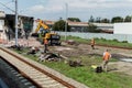 JCB excavator demolishes an old building