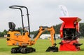 Jcb mini digger and red rhino mini crusher Royalty Free Stock Photo