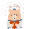 Je T\'aime. Cute bear holding big heart. Valentine\'s day card Royalty Free Stock Photo