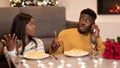 Jealous African Wife Having Quarrel With Husband During Date Indoor