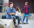 Jealous teen and his friends after conflict Royalty Free Stock Photo