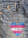 Jean with a transgender flag in a heart shape sewed in it Royalty Free Stock Photo