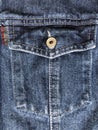 Jeans background with buttoned chest pocket Royalty Free Stock Photo