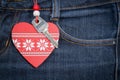 Jeans background with wooden heart and key..Valentine's day. Royalty Free Stock Photo