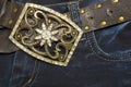 Jeans with a belt decorated with rhinestones