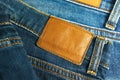 Jeans with brown leather label closeup Royalty Free Stock Photo