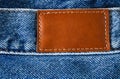 Jeans denim, back size, leather label patch on the belt, close-up macro view Royalty Free Stock Photo