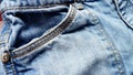 Jeans are a denim item of denim cotton fabric with riveted joints at the pockets. First made as work clothes for farmers. Trousers Royalty Free Stock Photo