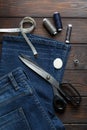 Jeans with dressmaking sewing utensils needlework