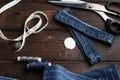 Jeans with dressmaking sewing utensils needlework
