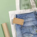 Jeans with empty craft label, textile bag and packing paper