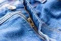 Jeans front with zipper open. Bright blue denim fabric texture background Royalty Free Stock Photo