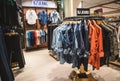 Jeans hanging on the floor in the department store to sell in many sizes in Central Department Store