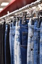 Jeans hanging on a hanger in a store Royalty Free Stock Photo