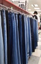 Jeans hanging on a hanger in a store Royalty Free Stock Photo