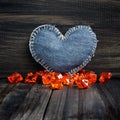 Jeans heart on wooden background