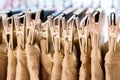 Jeans iron clothespins hanging in the closet