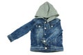 Jeans jacket with detachable hood and folded left arm. Fashionable jacket for child boy. Top view front.