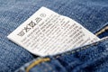 Jeans laundry care label Royalty Free Stock Photo