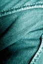 Jeans on leg close-up in cyan color Royalty Free Stock Photo