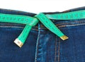 Jeans and measuring tape - slimming concept