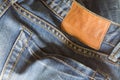 Jeans pants with back pocket and brown tag Royalty Free Stock Photo