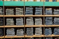 Jeans pants on the store shelf. Blue jeans denim Collection jeans stacked Royalty Free Stock Photo