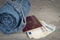 Jeans, passport and much money Royalty Free Stock Photo