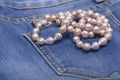 Jeans and Pearl Necklace Royalty Free Stock Photo